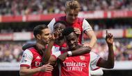 Arsenal berhasil mengemas 4 kemenangan beruntun di Liga Inggris usai mengalahkan tamunya Leeds United 2-1 dalam laga lanjutan Liga Inggris pekan ke-36, Minggu (8/5/2022) malam WIB. Dua gol kemenangan The Gunners dicetak oleh striker muda mereka, Eddie Nketiah. (AP/Frank Augstein)