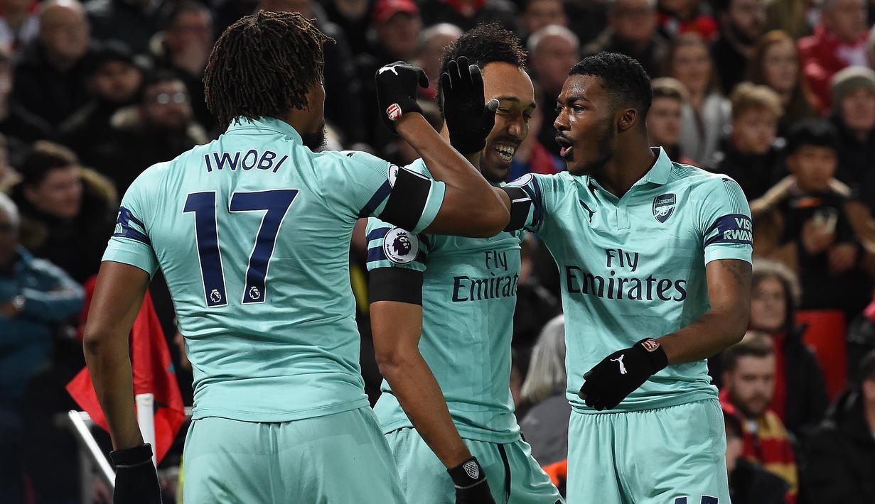 Hal tersebut membuat pemain macam Aubameyang dipaksa bermain di sisi sayap. Tentunya hasil yang didapat tidak sesuai dengan apa yang diinginkan. (AFP/Paul Ellis)