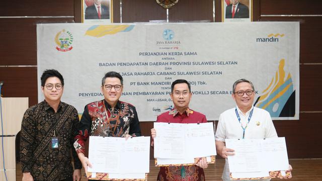 Acara penandatanganan kerja sama antara Bank Mandiri dengan Bapenda Provinsi Sulawesi Selatan dan Jasa Raharja di Makassar