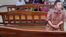 Hendra Saputra, yang menjabat sebagai  pramubakti  di Kementerian Koperasi dan UKM terseret kasus dugaan korupsi proyek videotron yang melibatkan Riefan Avrian (anak dari Menteri Koperasi dan UKM, Syarief Hasan) (23/7/14) (Liputan6.com/Miftahul Hayat)