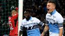 Gelandang Lazio, Sergej Milinkovic-Savic, melakukan selebrasi usai membobol gawang Atalanta pada laga Coppa Italia 2019 di Stadion Olympic, Roma, Rabu (15/5). Lazio menang 2-0 atas Atalanta. (AFP/Vincenzo Pinto)