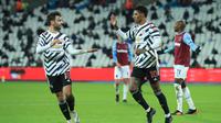 Marcus Rashford merayakan gol ketiga Manchester United ke gawang West Ham United, Minggu (06/12/2020) dini hari WIB. (AFP)