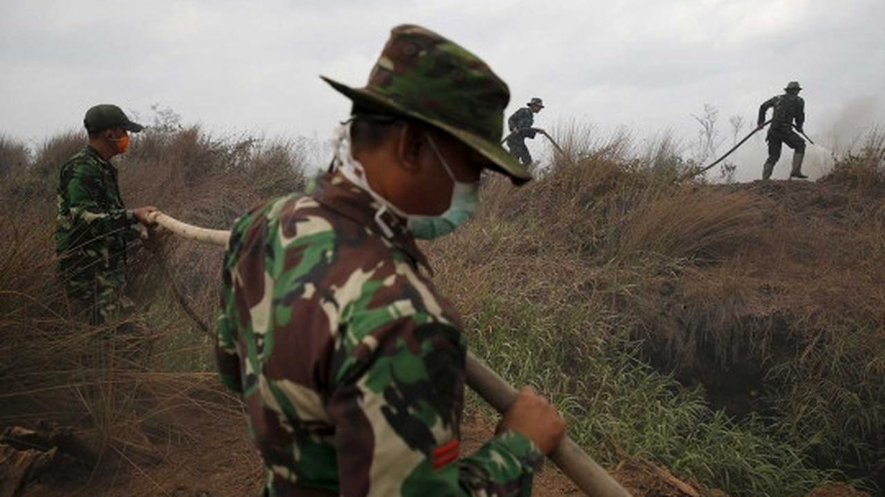 Aksi TNI jinakkan kabut asap di Sumsel