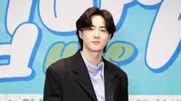 Suho EXO dalam konferensi pers drakor Behind Your Touch. (Foto: Netflix)