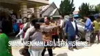 Rekaman video seorang istri mendatangi tempat pernikahan suami yang menikah lagi.