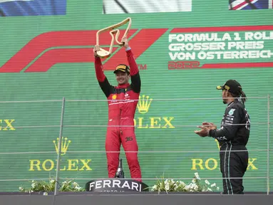 Pembalap Scuderia Ferrari, Charles Leclerc, berhasil merebut kemenangan dalam balapan Formula 1 GP Austria di Sirkuit Red Bull Ring, Spielberg, pada Minggu (10/7/2022). Pembalap asal Monako ini diikuti oleh pembalap Oracle Red Bull Racing, Max Verstappen, di posisi kedua, dan pembalap Mercedes AMG Petronas, Lewis Hamilton, di posisi ketiga. (AP Photo/Matthias Schrader)