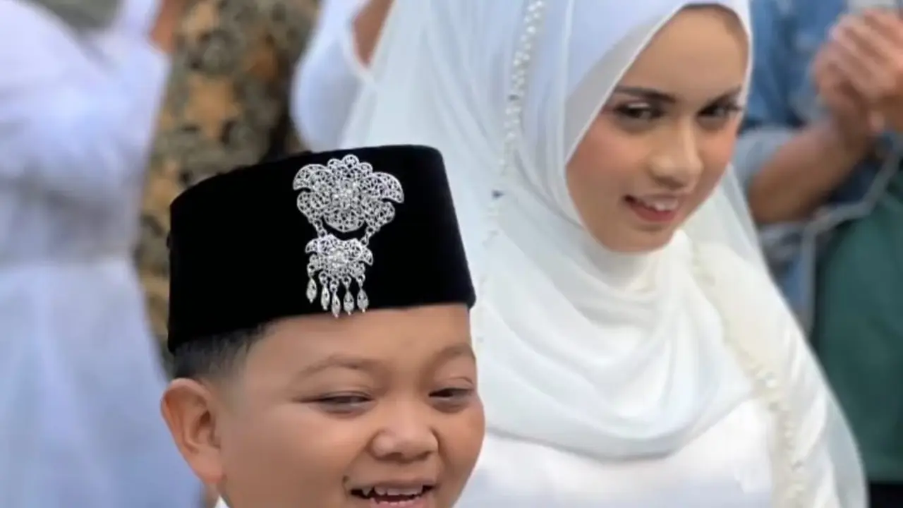 Megi Irawan dan Riva Syahdila