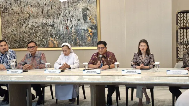 Direktur Human Capital and Compliance BNI, Munadi Herlambang dalam konferensi pers dana nasabah umat Gereja Aek Nabara di Grha BNI, Jakarta, Rabu (22/4/2026). (Liputan6.com/Arief)