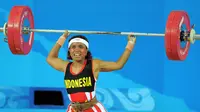 4. Lisa Raema Rumbewas (angkat Besi Putri 48 Kilogram) - Meraih medali perunggu Asian Games 2002. (AFP/Jung Yeon-Je)