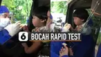 Ekspresi bocah ini saat sedang melakukan rapid test bikin gemes.