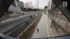 Kendaraan melintas di kawasan Sudirman, Jakarta, Sabtu (11/8). Menjelang Asian Games 2018, pedestrian di kawasan Sudirman sudah dapat dinikmati masyarakat. (Liputan6.com/Herman Zakharia)