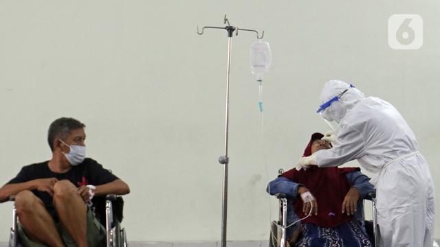 FOTO: Kesibukan RSUD Cengkareng di Tengah Peningkatan Kasus COVID-19