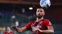 Rekrutan anyar AC Milan, Olivier Giroud juga berhasil tampil impresif pada laga debutnya di Rossoneri. Pelatih Stefano Pioli langsung mempercayakan Giroud sebagai starter di laga tersebut. (Foto: AFP/Miguel Medina)