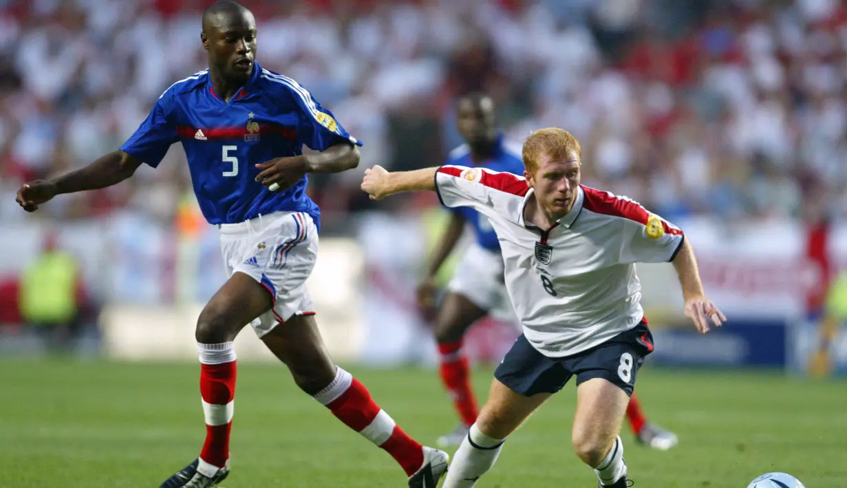 Paul Scholes pensiun dari Timnas Inggris tahun 2004 saat berusia 30 tahun setelah bermain 66 kali dan mencetak 24 gol. Keluarga dan karier di klub yang lebih penting menjadi alasannya pensiun dini. (AFP/Adrian Dennis)
