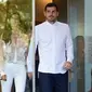 Iker Casillas bersama sang istri, Sara Carbobero, meninggalkan rumah sakit di Porto tempat ia dirawat akibat serangan jantung, Senin waktu setempat (6/5/2019). (AFP/Miguel Riopa)