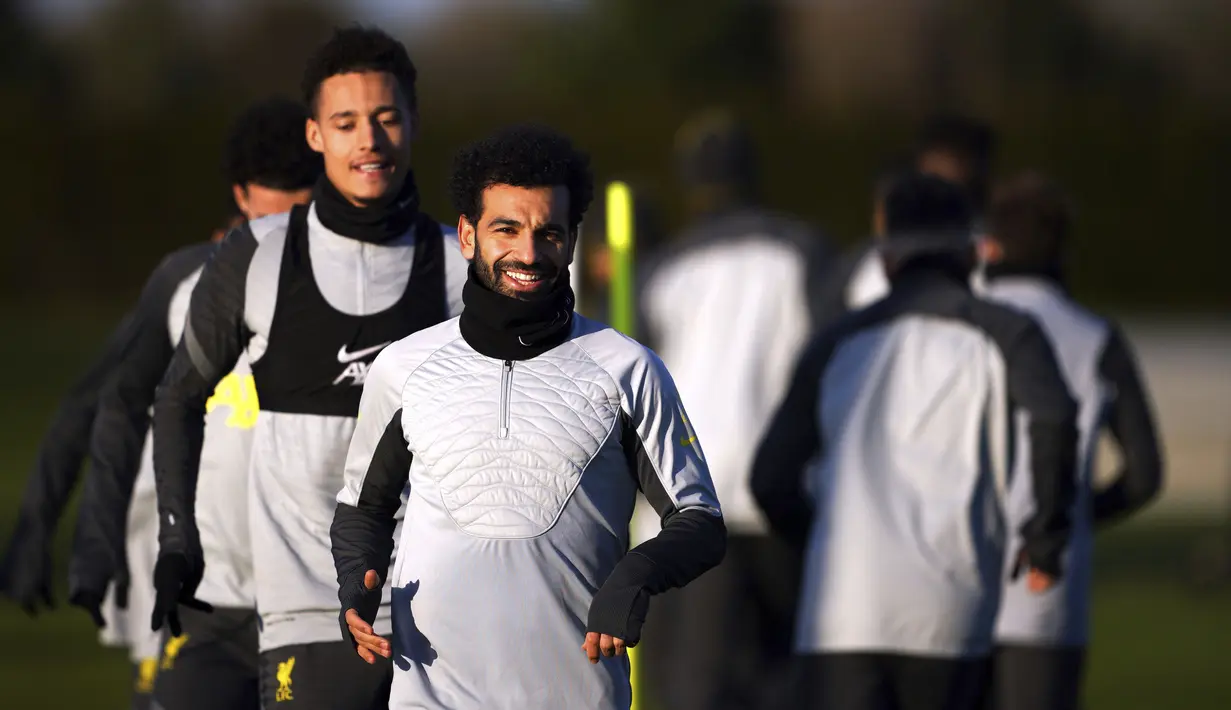 Penyerang Liverpool Mohamed Salah mengikuti sesi latihan jelang leg kedua babak 16 besar Liga Champions di AXA Training Centre, Senin (7/3/2022). Liverpool akan menyambut Inter Milan pada babak 16 besar Liga Champions di Anfield pada Rabu, 9 Februari 2022 dini hari WIB. (Peter Byrne/PA via AP)