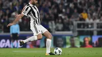 Andrea Barzagli mewanti-wanti Juventus jelang duel melawan AC Milan. (Miguel MEDINA / AFP)