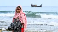 Kali ini mereka berhenti di kawasan pantai Ujong Kareung Kecamatan Sukajaya Kota Sabang. (CHAIDEER MAHYUDDIN / AFP)