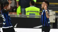 Lautaro Martinez mencetak gol Inter Milan saat bertanding melawan Cagliari (29/9/2018). (AFP/Miguel Medina)
