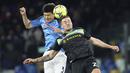 Pemain Napoli, Kim Min-Jae duel udara dengan pemain Lazio, Elseid Hysaj, pada laga Liga Italia di Stadion Diego Armando Maradona, Sabtu (4/3/2023). Duel Napoli vs Lazio yang berlangsung di Stadion Diego Armando Maradona, Sabtu (4/3/2023) berakhir dengan skor 0-1 untuk kemenangan sang tamu. (Alessandro Garofalo/LaPresse via AP)
