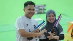 Berlaga di Shooting Racne Sports Authority of Thailand, Iqbal/Arista sukses berhasil membekuk wakil Vietnam, Trinh Thu Vinh/Pham Quang Huy, dengan skor 17-9. (Bola.com/Bagaskara Lazuardi)