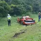 Supercar McLaren kecelakaan di Tol Jagorawi, Minggu (3/5/2020). Mobil mewah itu rusak berat setelah menabrak pohon palm. (Achmad Sudarno/Liputan6.com)