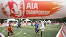 Pemain bertanding dalam kompetisi sepak bola AIA Championship di Jakarta, Minggu (28/2/2016). Kompetisi digelar untuk mencari tim yang akan bergabung dengan Bambang Pamungkas pada kompetisi regional AIA Championship. (Liputan6.com/Immanuel Antonius) 