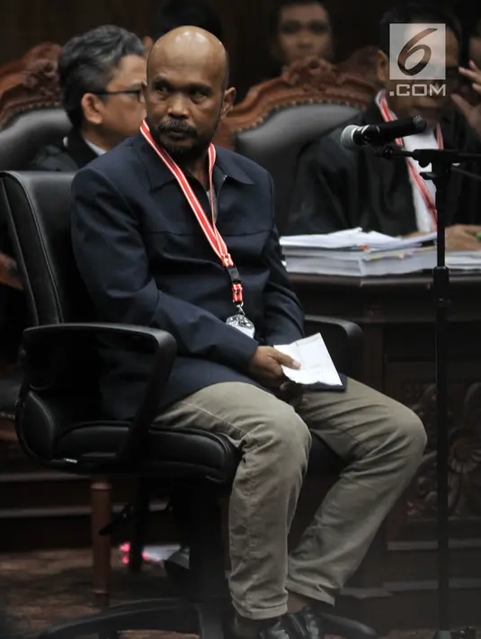 Saksi fakta Pemohon, Idham Amiruddin saat mengikuti sidang lanjutan sengketa Pilpres 2019 di Mahkamah Konstitusi, Jakarta, Rabu (19/6/2019). Kuasa hukum Pemohon menghadirkan 15 saksi fakta dan 2 saksi ahli pada sidang lanjutan sengketa Pilpres 2019.  (merdeka.com/Iqbal S. Nugroho)