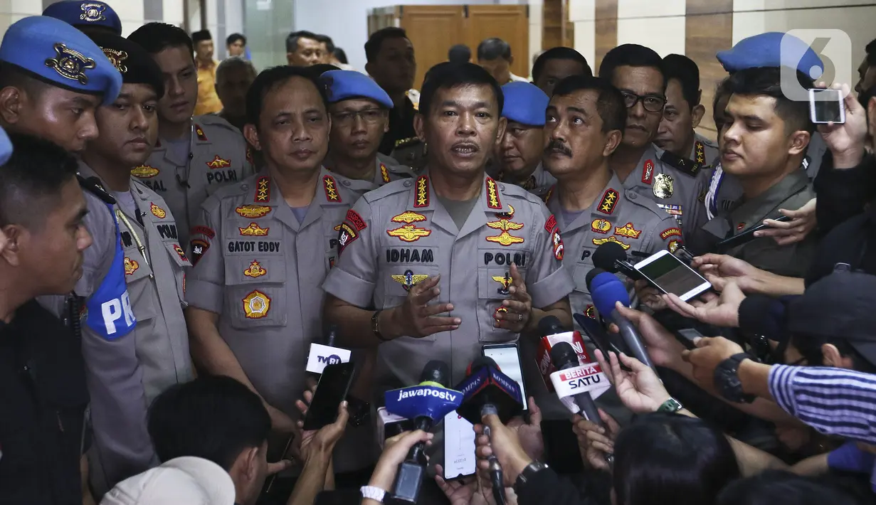 Kapolri Jenderal Polisi Idham Azis memberikan keterangan usai mengikuti rapat kerja perdana dengan Komisi III DPR di Kompleks Parlemen, Jakarta, Kamis (30/1/2020). (Liputan6.com/Johan Tallo)