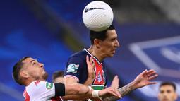 Angel Di Maria. Usai meninggalkan Real Madrid pada 2014/2015, ia sempat bermain 1 musim bersama Manchester United sebelum berseragam PSG di 5 musim terakhir. Meskipun menjadi seteru di El-Clasico, La Pulga adalah rekan setim Di Maria di Timnas Argentina. (Foto: AFP/Franck Fife)