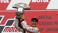 Pebalap Honda, Dani Pedrosa, membuat kejutan dengan menjuarai MotoGP Jepang, Minggu (11/10/2015). Rossi finis di urutan kedua. 