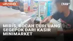 Aksi pencurian uang di minimarket viral usai terekam kamera karyawan minimarket. Pencurian viral lantaran dilakukan oleh seorang bocah yang saat penjaga kasir 'lengah'. Bocah tersebut mengambil segepok uang dari laci kasir dan langsung kembali berpur...