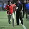 Hendri Mulyadi, suporter Timnas Indonesia nekat masuk ke lapangan hijau pada laga kualifikasi Piala Asia 2011 antara Indonesia vs Oman sebagai bentuk protes dan kecewa terhadap PSSI yang dipimpin oleh Nurdin Halid. ( AFP/Bay Ismoyo )