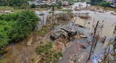 Rumah warga yang hancur akibat luapan Kali Pesanggrahan yang alirannya menyempit karena longsoran sampah di Tempat Pembuangan Akhir (TPA) Cipayung, Depok, Jawa Barat, Kamis (14/5/2026). (merdeka.com/Arie Basuki)