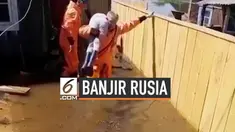 Kawasan Irkustsk di Rusia diterjang banjir hebat. Hujan deras memicu aliran sungai Anggara meluap dan tumpah ke sekitar permukiman.