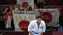 Emas Kiyuna merupakan medali kedua Jepang di karate, setelah Kiyou Shimizu mengklaim perak di kata putri pada hari Kamis (05/08/2021). Olimpiade Tokyo mungkin menjadi satu-satunya waktu olahraga tersebut ditampilkan karena di edisi berikutnya cabor ini telah dikeluarkan. (Foto: AP/Vincent Thian)