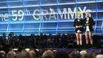 Duo asal Ohio, Twenty One Pilots menerima penghargaan Best Pop Duo/Group Performance, di panggung Grammy Awards 2017 di Staples Center, Los Angeles, Minggu (12/2). Nominasi itu dimenangkan lewat single 'Stressed Out'. (Kevork Djansezian/Getty Images/AFP)