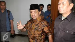 Terdakwa mantan Bupati Bangkalan Fuad, Amin saat tiba di Pengadilan Tipikor untuk menjalani sidang lanjutan, Jakarta, Senin (10/8/2015). Agenda sidang mendengarkan keterangan 16 saksi dari SKPD Bangkalan dan pihak bank. (Liputan6.com/Helmi Afandi)