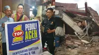 TOP 1 bantu bengkel rekanan yang terkena musibah gempa bumi di Aceh (ist)