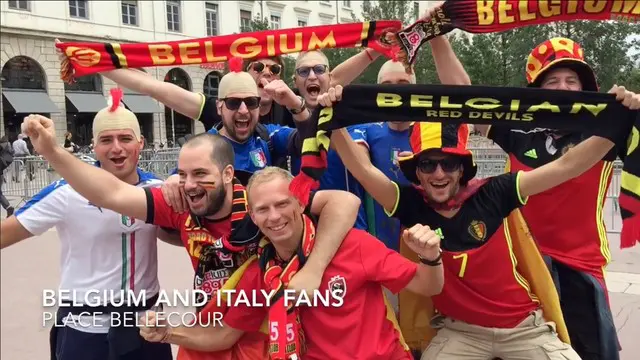 Ekin Gabriel, koresponden bola.com merekam kebersamaan fans Italia dan Belgia yang berada di area fanzone, Lyon.