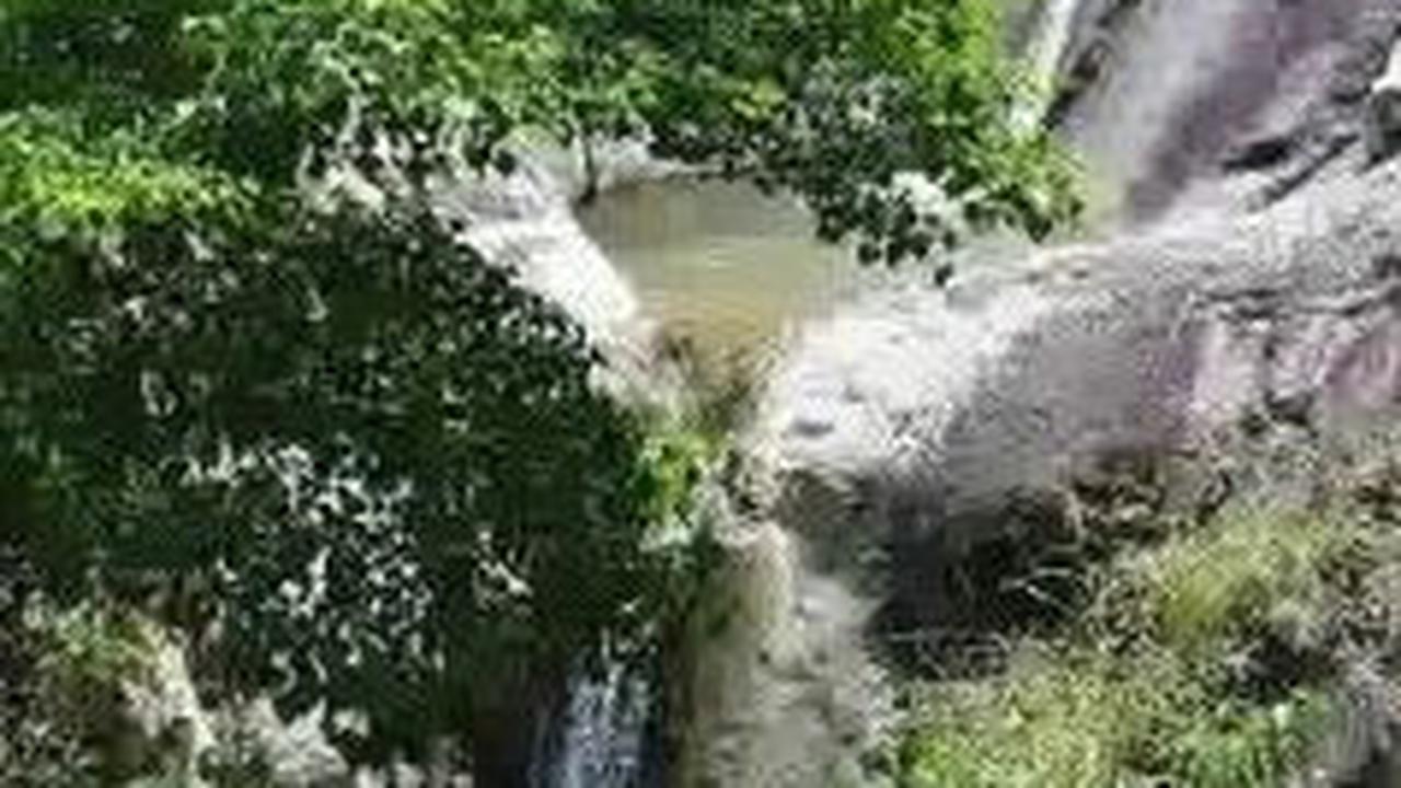 Dipercaya Jadi Lokasi Minta Berkat Leluhur, Ini Fakta Air Terjun Batu Sawan di Samosir