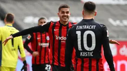 Andre Silva. Striker berusia 25 tahun ini baru saja direkrut RB Leipzig musim ini dari Eintracht Frankfurt. Musim lalu ia menjadi runner-up di bawah Robert Lewandowski dengan mencetak 28 gol yang dibuatnya dalam 32 laga di Bundesliga. (Foto: AFP/Pool/Kai Pfaffenbach)