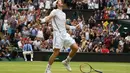 Ekspresi Andy Murray saat mengalahkan petenis Kanada, Milos Raonic pada tunggal putra Wimbledon Championships 2016 di The All England Lawn Tennis Club,  Wimbledon, London, (10/7/2016). (AFP/Glyn Kirk)