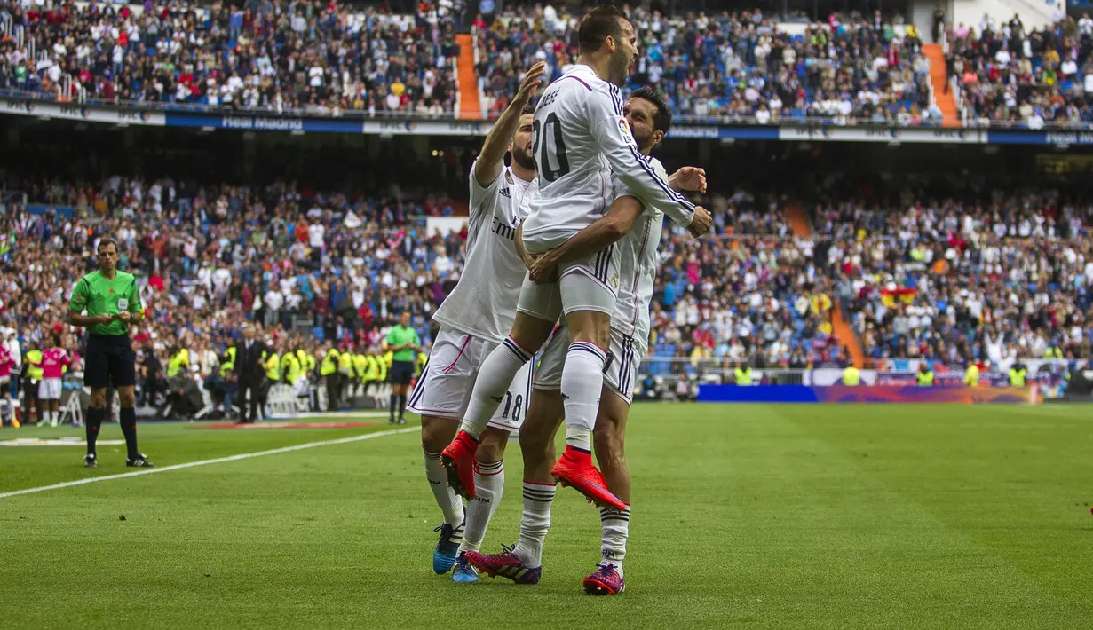 Pemain Real Madrid merayakan gol Jese Rodriguez pada menit ke-83 (AP Photo/Andres Kudacki)