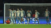 Pemain Manchester City bereaksi setelah kebobolan gol ketiga selama pertandingan fase liga Liga Champions UEFA antara Paris Saint-Germain dan Manchester City di Stadion Parc des Princes di Paris pada 22 Januari 2025. (FRANCK FIFE/AFP)
