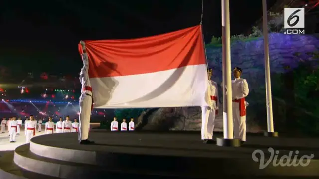 Dipimpin penyanyi Tulus, lagu 'Indonesia Raya' dinyanyikan hampir seluruh warga yang menonton pembukaan Asian Games 2018.