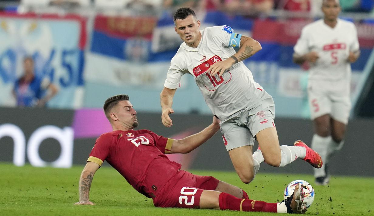 Laga panas selama 90 menit ini berkesudahan 3-2 untuk kemenangan Swiss. (AP/Ricardo Mazalan)