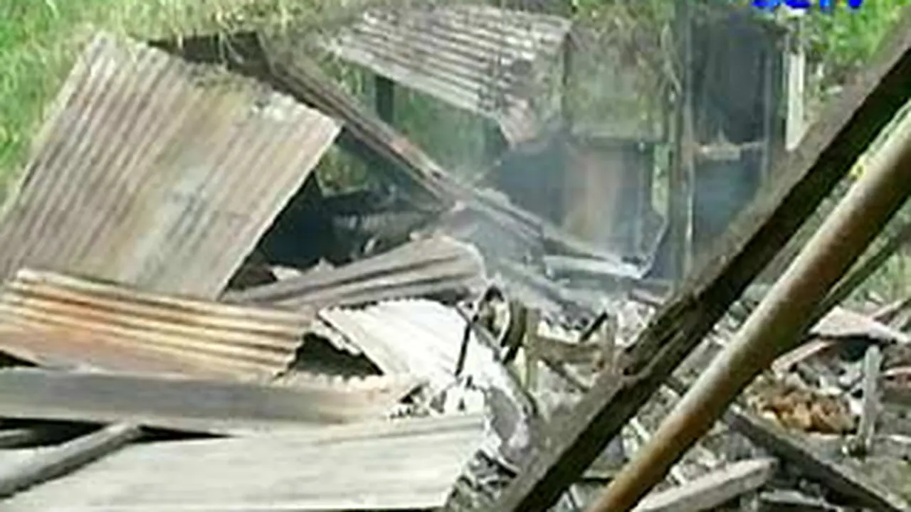 100209arusak-rumah.jpg