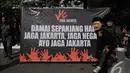 Aksi 'Jaga Jakarta' bertujuan untuk memperkuat komitmen masyarakat   agar bersama-sama memelihara Ibu Kota, Kawasan Bunderan HI,   Jakarta, Minggu (23/11/2014). (Liputan6.com/Herman Zakharia)