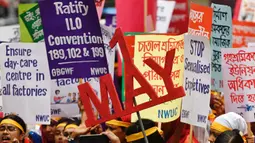 Para aktivis dan pekerja ikut serta dalam demonstrasi Hari Buruh Internasional 2025 di Dhaka, Bangladesh pada Kamis 1 Mei 2025. (Syed Mahamudur RAHMAN/AFP)